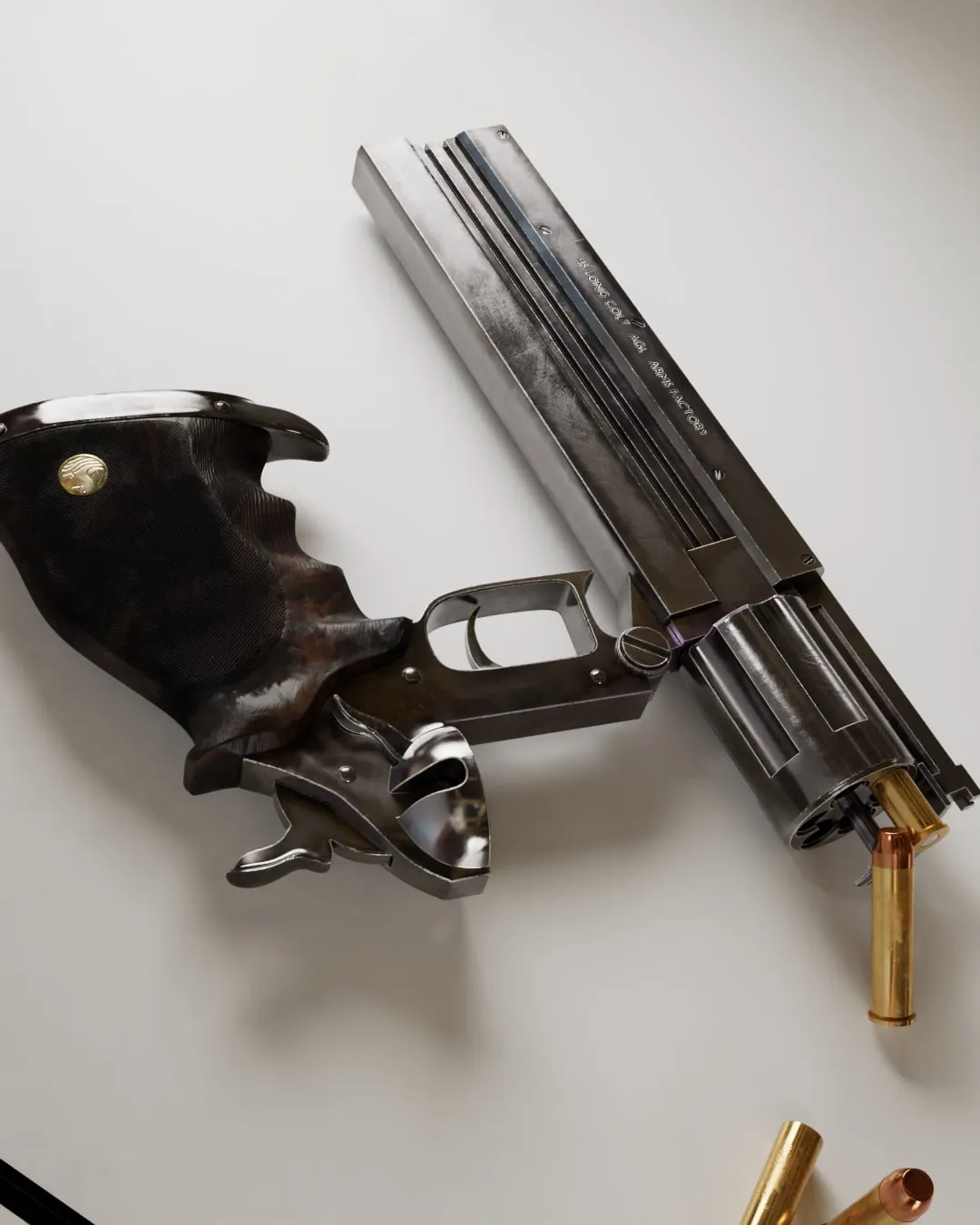 Le revolver ouvert pour le chargement, vu de dessus, cartouches à côté
